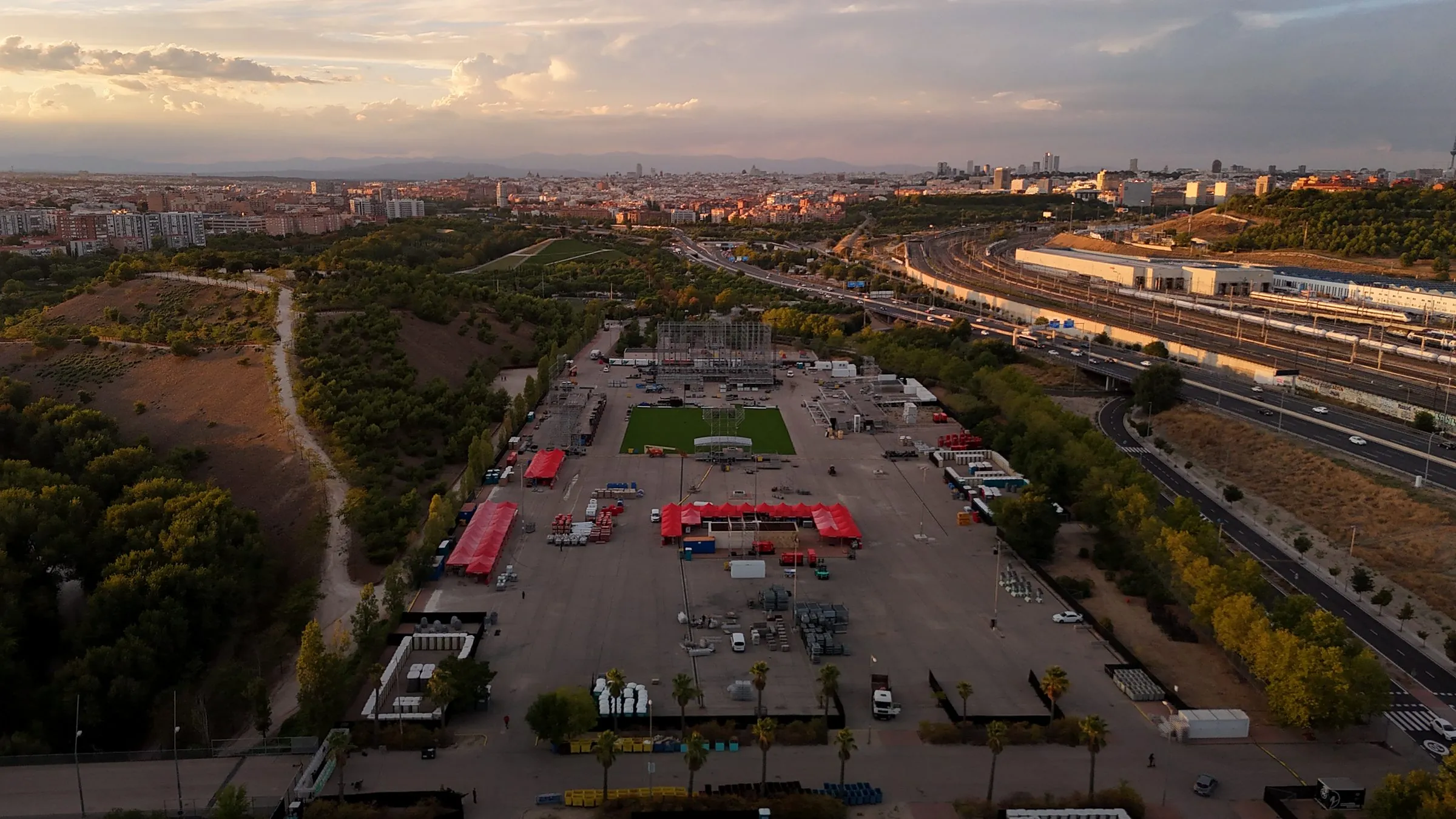 Aerial view of a festival site in Madrid at sunset